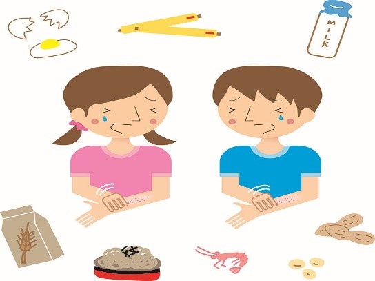 Boy and Girl with allergies surrounded by different foods